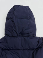 Navy hooded puffer jacket hood and upper back view with padded seams