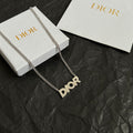 Dior necklace with silver chain and openwork Dior logo pendant