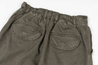Stone Island olive cargo pants back view with welt pockets and elastic waistband