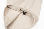 Stone Island beige cargo pants with drawcord toggle at pocket opening