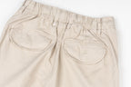 Stone Island beige pants with elastic waist and oval rear flap pockets