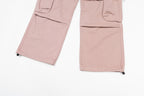 Cargo trousers, light pink, knee-to-hem view with cargo pocket panels