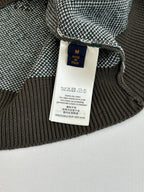 Size tag on knit sweater with ribbed collar; marked made in Italy
