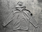 Gray zip-up hoodie with drawstring hood and front kangaroo pocket