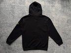 Black zip-up hoodie with hood, drawstrings, and pouch pocket, back view