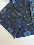 Louis Vuitton blue plaid jacket inner label with gold-tone button accents