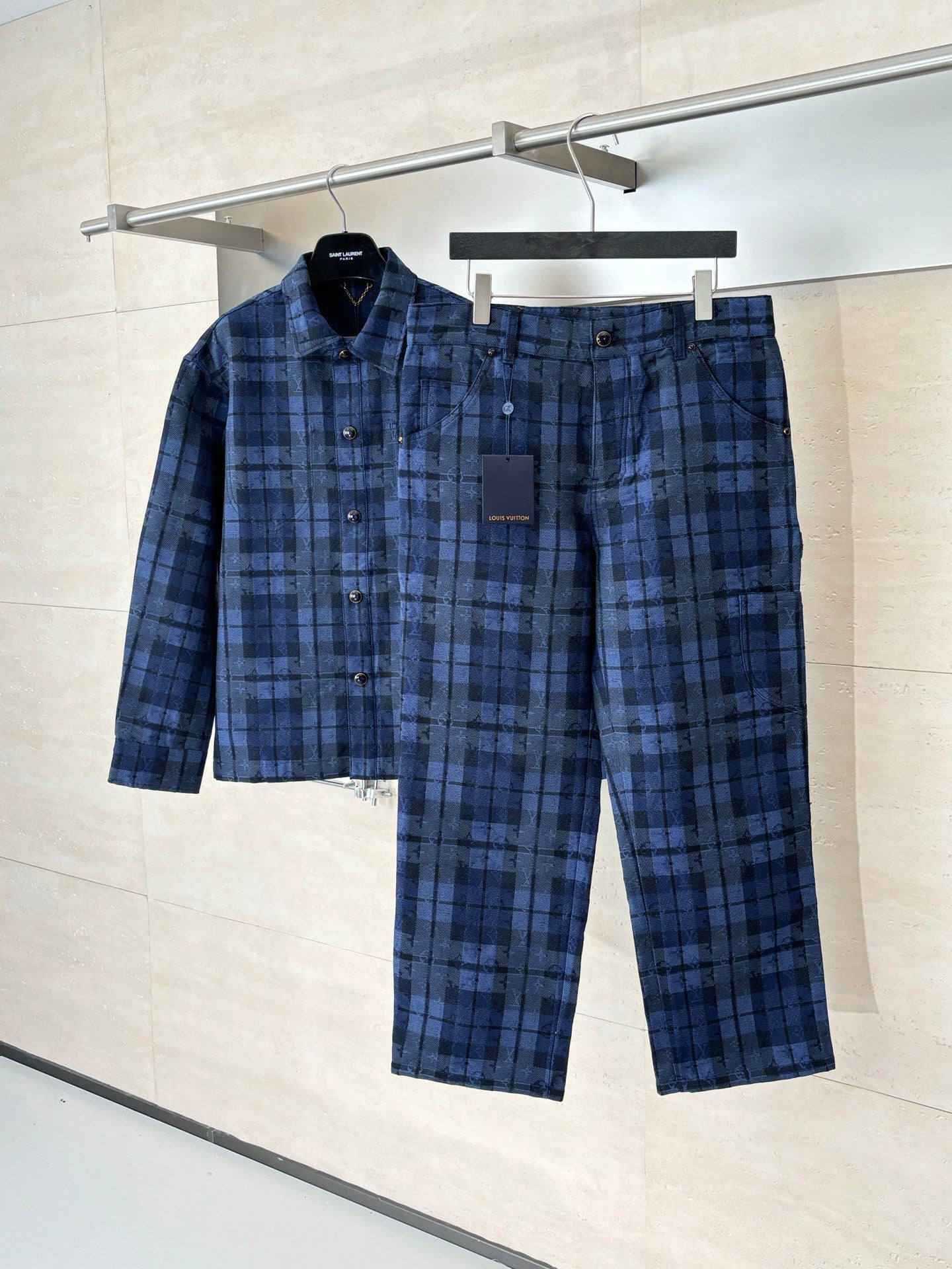 Checked trousers in dark blue grid, buttoned front with cuffed pant legs