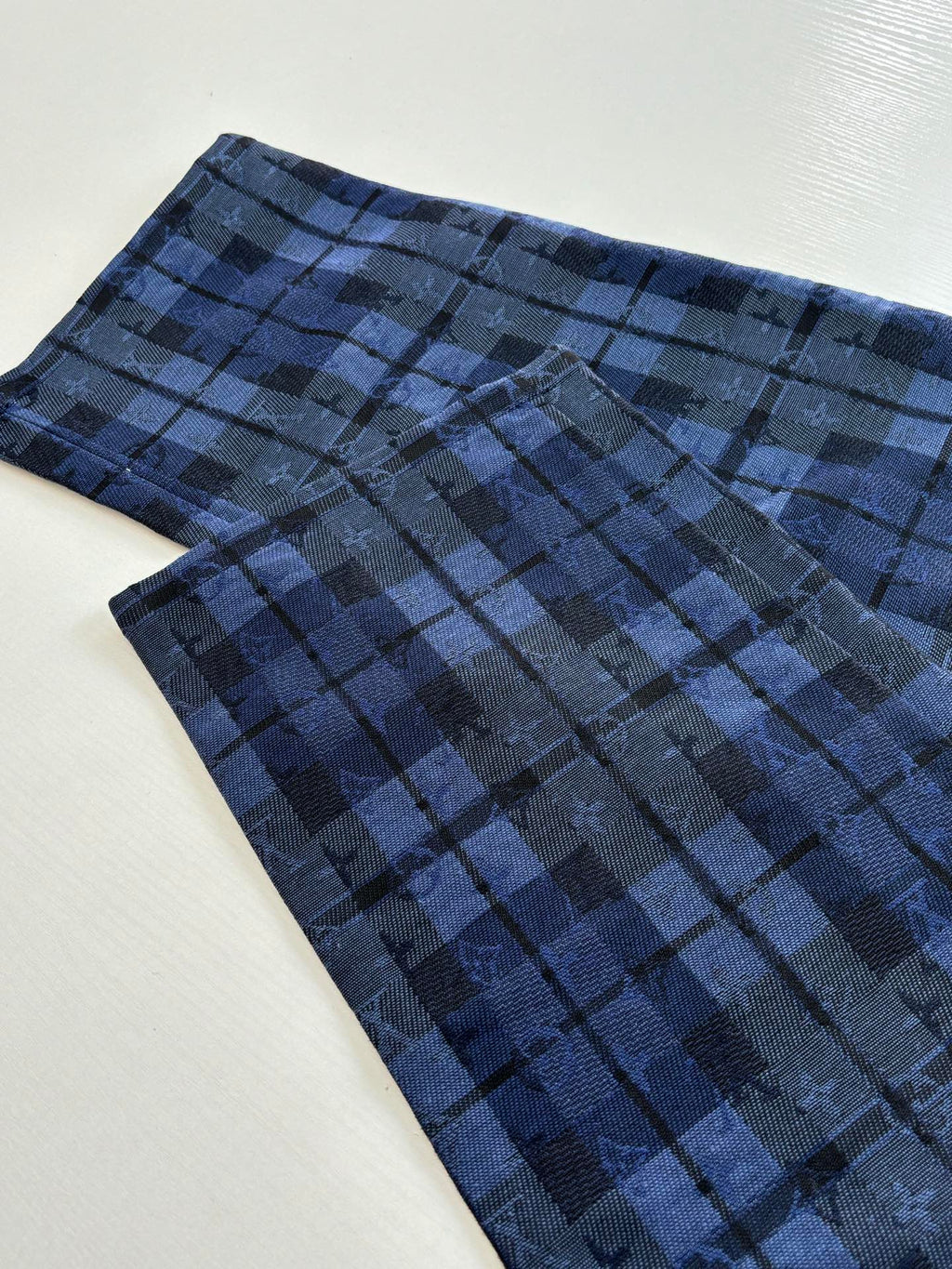 Dark blue plaid trousers with back yoke and straight waistband seam