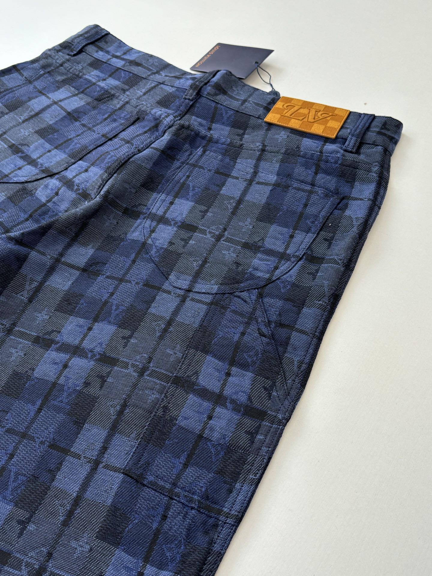 Blue plaid pants with waistband and front button, Louis Vuitton tag