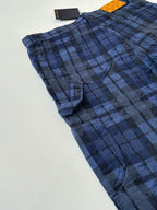 Dark blue plaid trousers with pleated front and curved side pocket