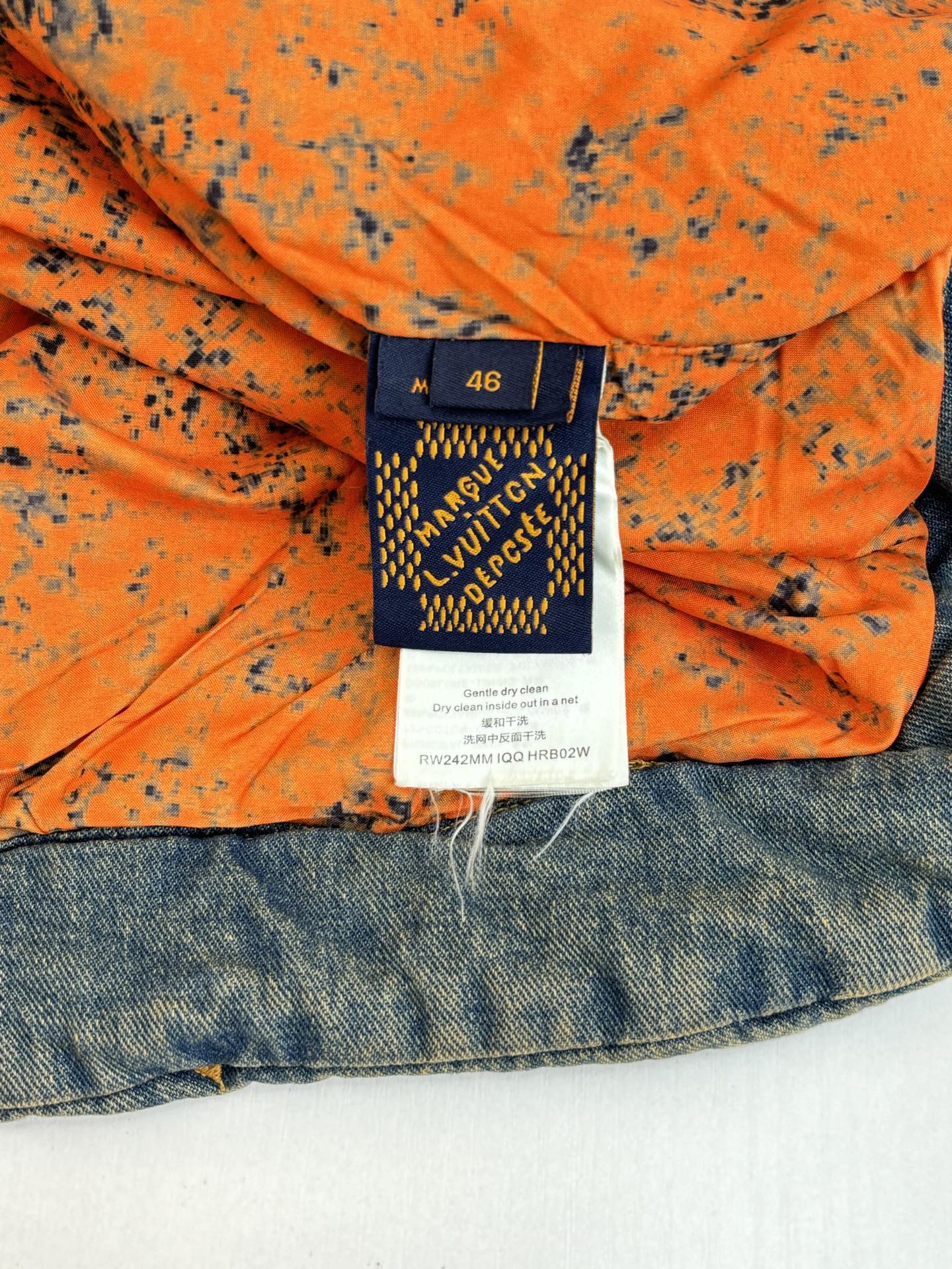 Louis Vuitton jacket interior size label on orange lining, size M, 46