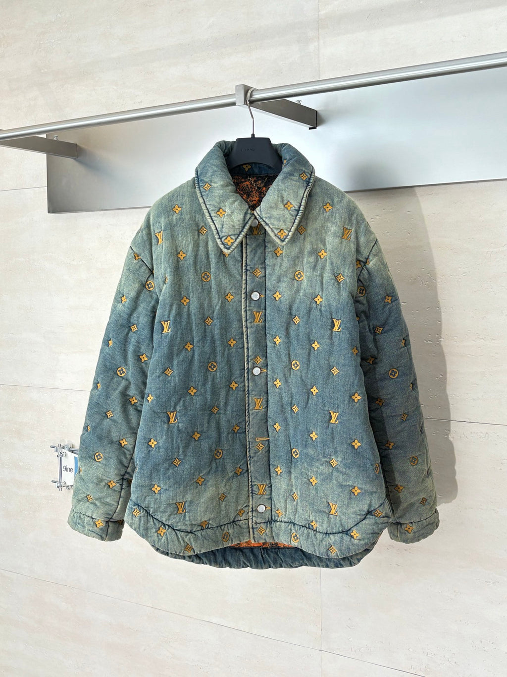 Louis Vuitton long denim jacket with yellow monogram pattern, button front, full sleeves