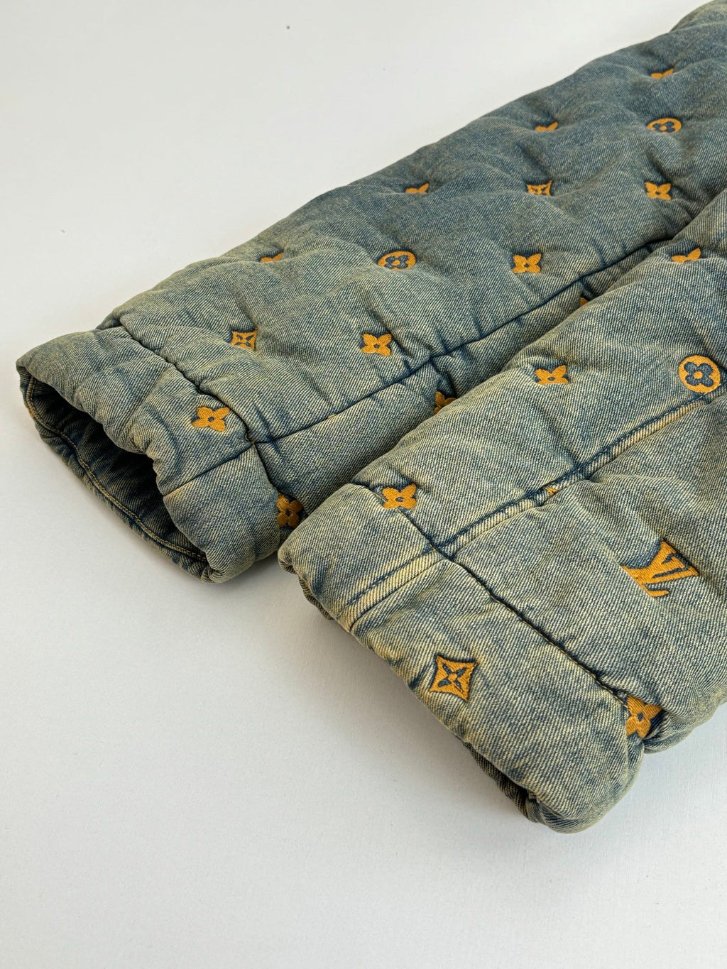 Louis Vuitton long denim jacket hem and cuffs with yellow monogram pattern
