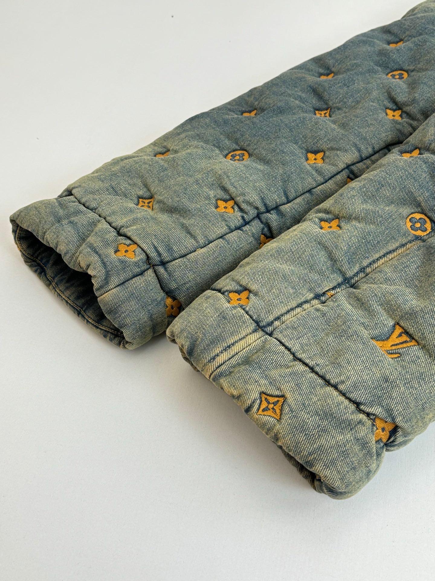 Louis Vuitton long denim jacket hem and cuffs with yellow monogram pattern