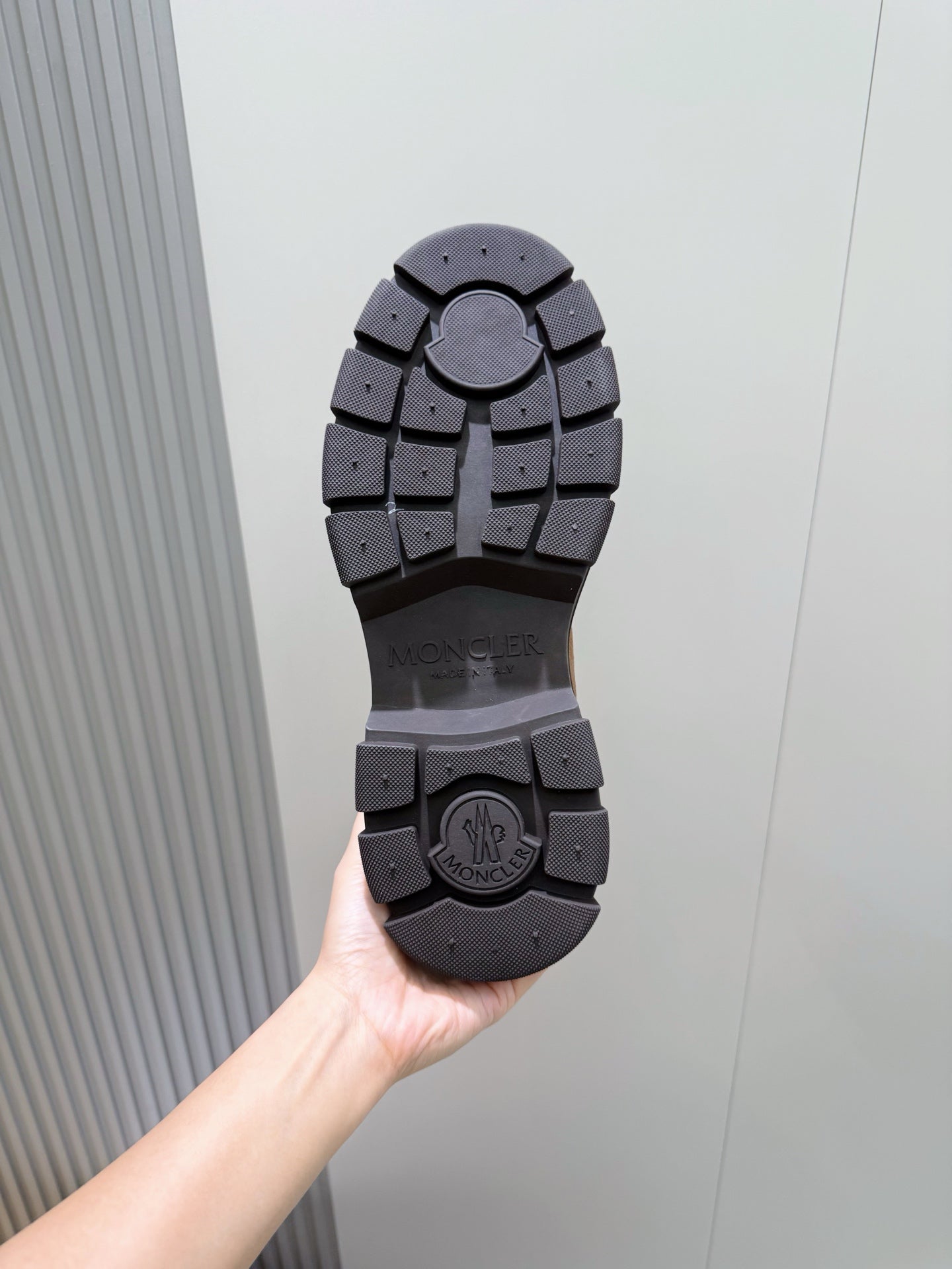 Moncler rubber boot outsole tread with brand markings
