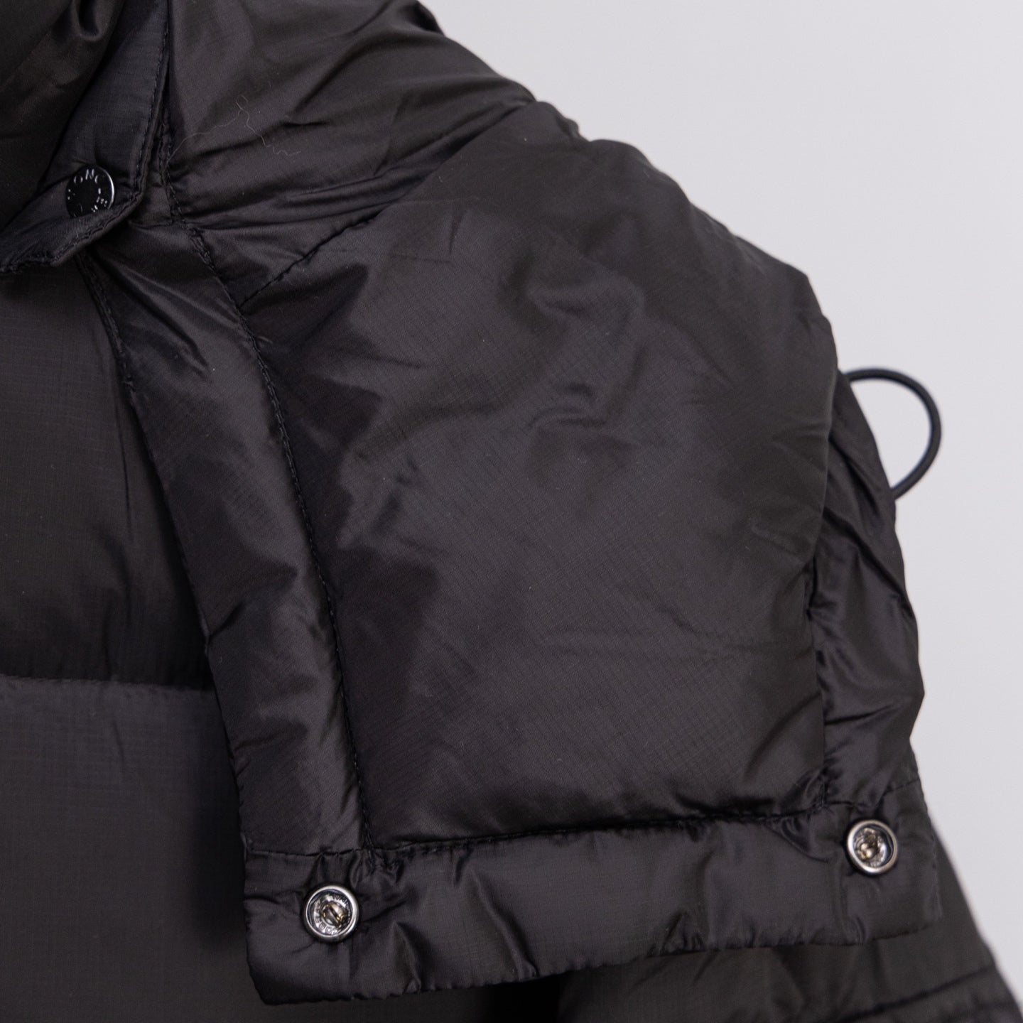 Moncler long puffer jacket shoulder with button details, black