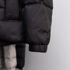 Long black puffer jacket sleeve with elastic cuff and quilting