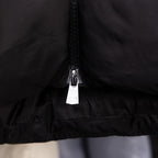 Long black puffer jacket, centered front zipper and hem