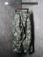 Louis Vuitton camouflage cargo pants on hanger with flap pockets and side seams