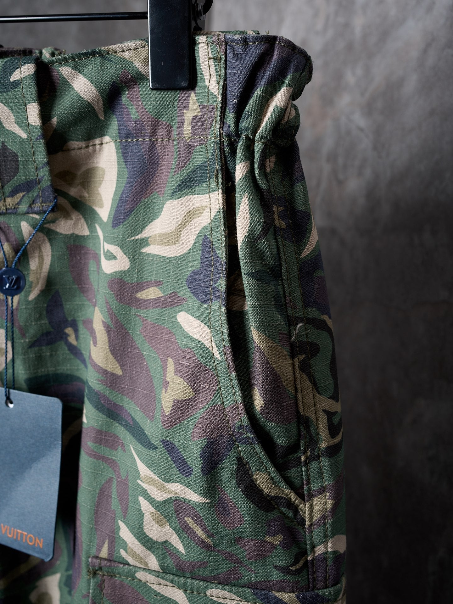 Louis Vuitton camouflage cargo pants close-up of waistband and drawcord tie