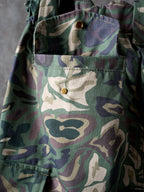 Louis Vuitton camouflage cargo pants front view close-up of waistband button