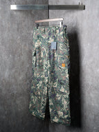Louis Vuitton camouflage cargo pants on hanger with utility pockets and belt loops