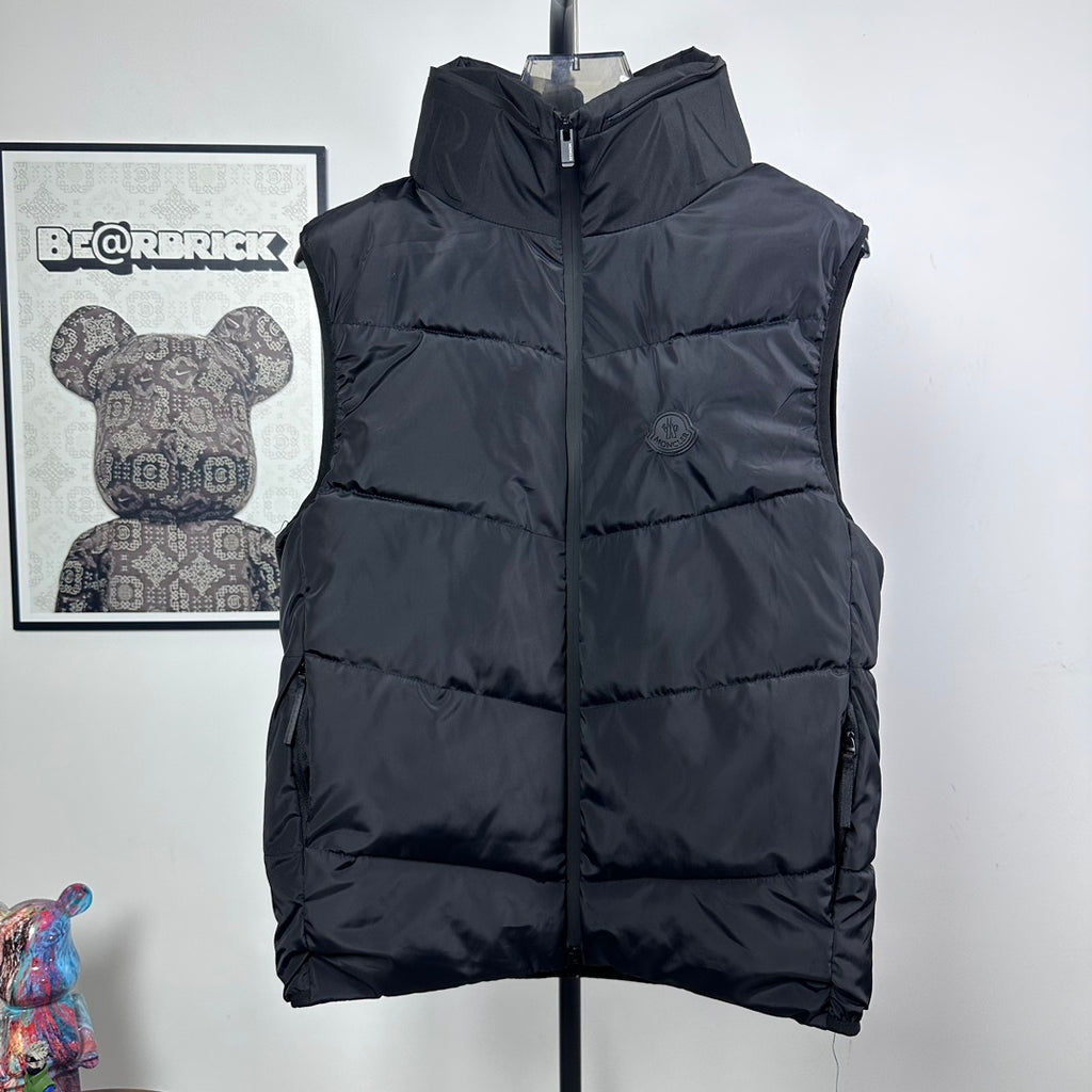 Moncler hooded puffer vest, sleeveless front view, dark quilted baffles and zip
