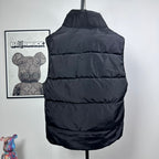 Moncler hooded puffer vest, back view, dark quilted baffles and adjustable hood