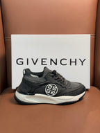 Dark gray lace-up sneakers with front logo emblem and white sole