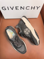 Dark gray lace-up sneakers, side view, mesh panels and white midsole