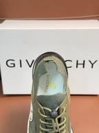 Givenchy sneaker toe view with olive knit upper and lace-up eyelets