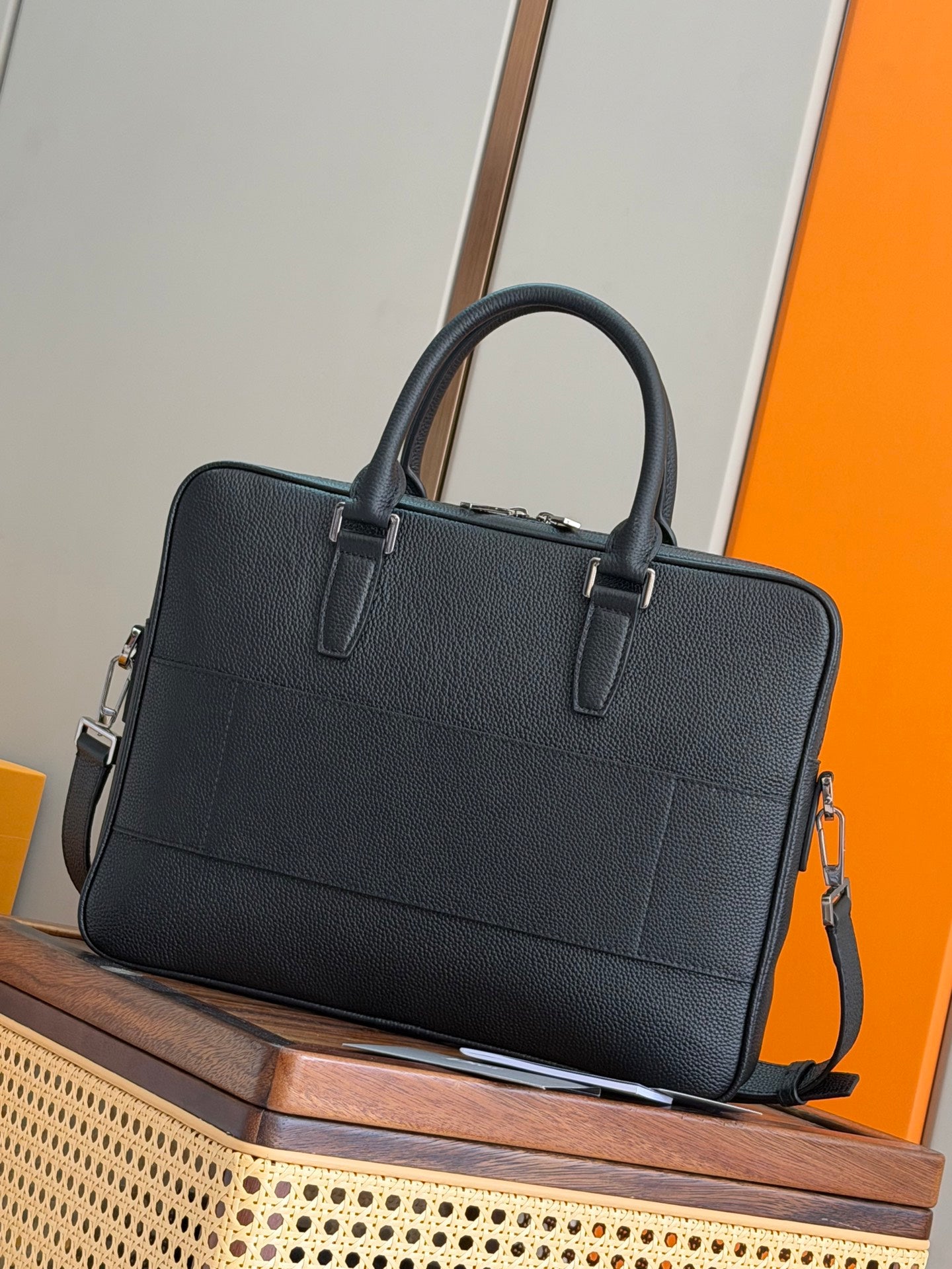 Dior men’s leather bag with top handles and detachable shoulder strap, dark