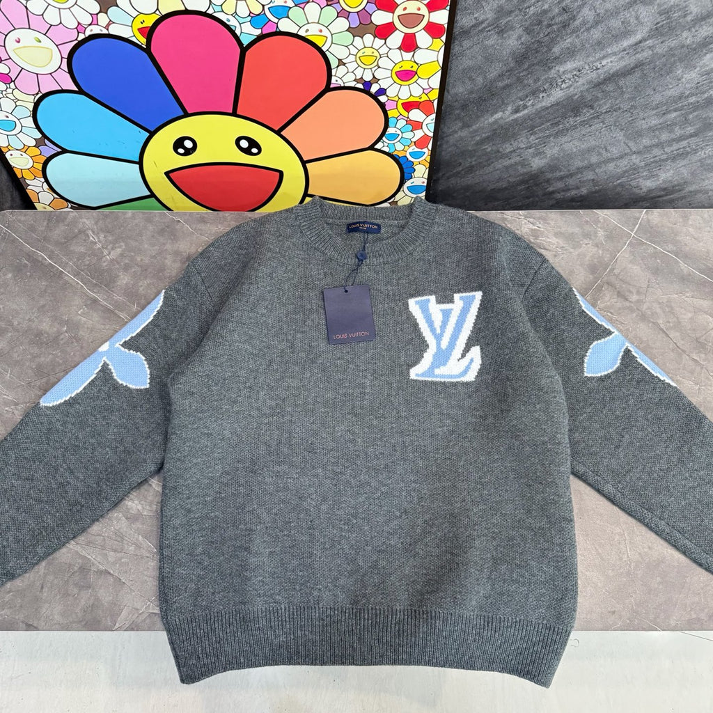 Gray knit sweater with Louis Vuitton blue monogram and white star motifs