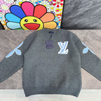 Gray knit sweater with Louis Vuitton blue monogram and white star motifs