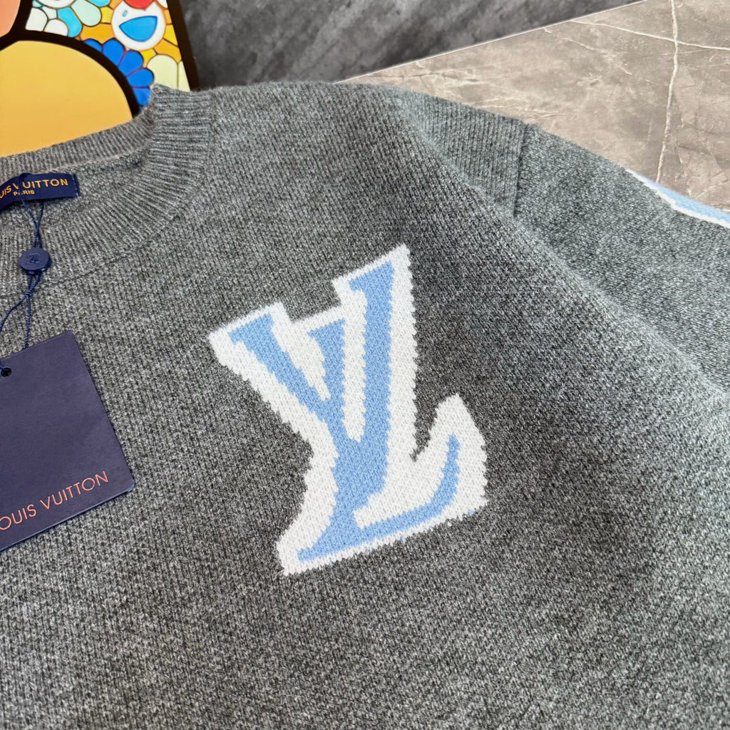 Gray knit long-sleeve sweater with large blue LV-style logo on the chest