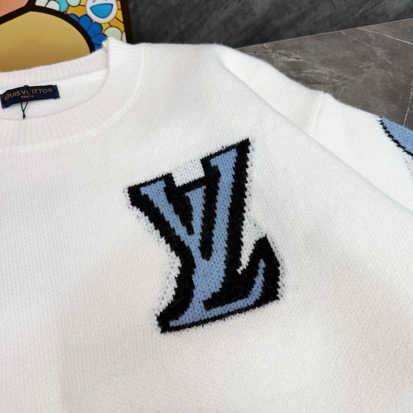 White knit sweater with Louis Vuitton blue logo embroidery, crew neck