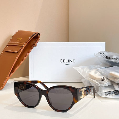 Celine sunglasses with dark tortoiseshell frames and round lenses, gold logo detail
