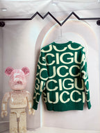 Long-sleeve knit sweater, green with cream logo-style lettering pattern