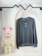 Fendi dark gray long-sleeve sweater with studded trim at neckline and hem