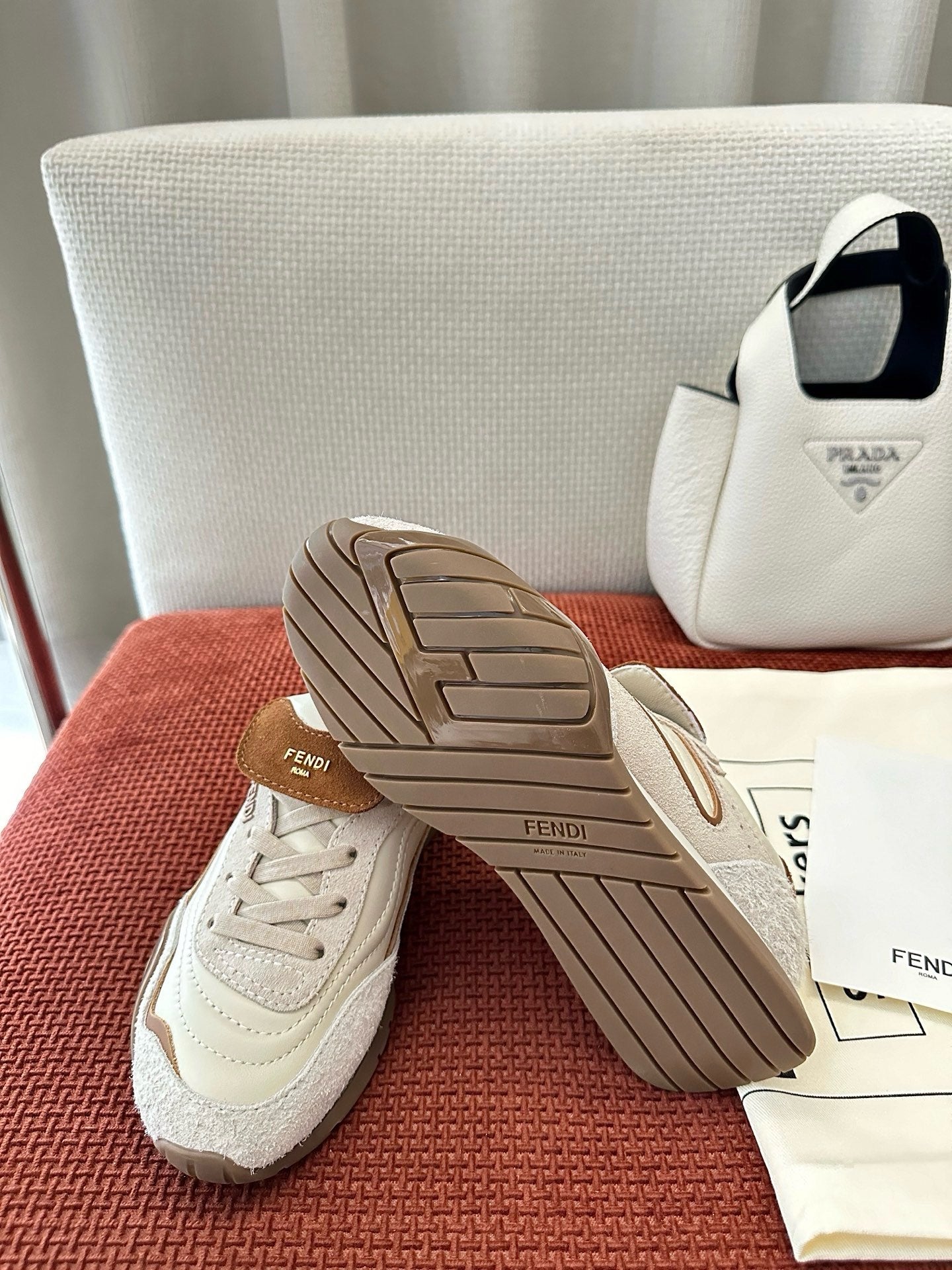 Fendi unisex sneakers showing brown striped outsole tread