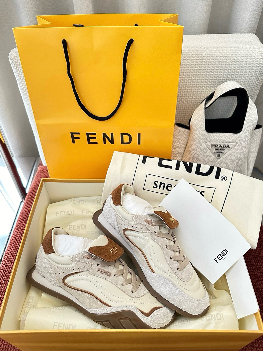 Fendi unisex white sneakers with brown suede panels, laces, and contrast sole