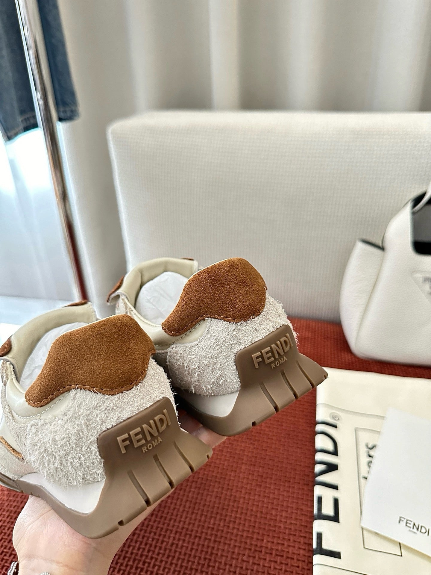 Fendi unisex white sneakers with brown suede heel tabs and beige outsole