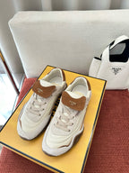 Fendi unisex white low-top sneakers with brown suede heel patch and laces