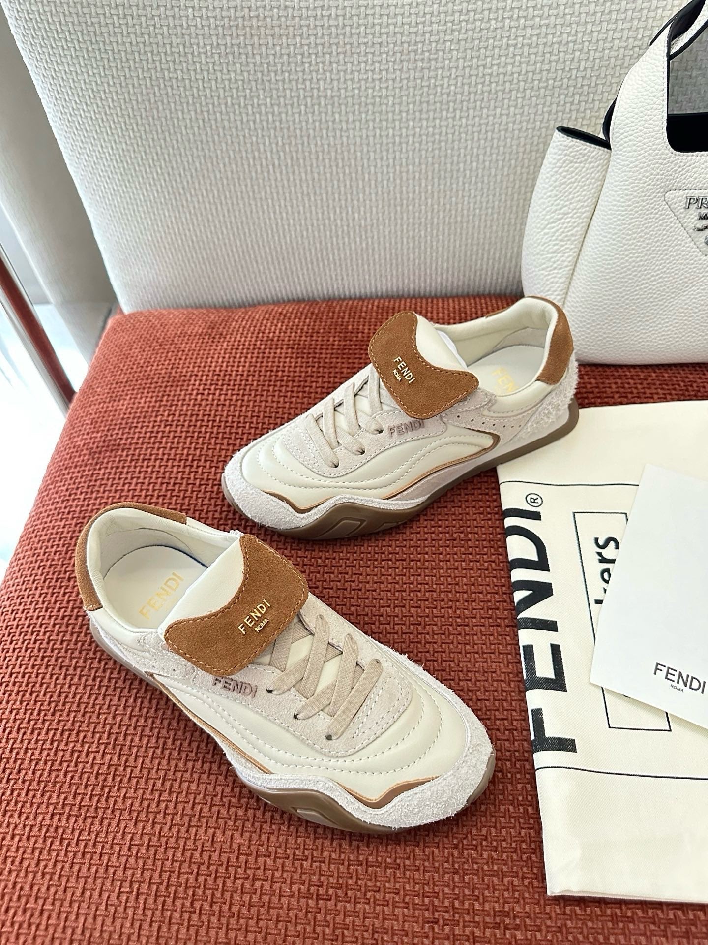 Fendi unisex white sneakers with brown suede heel tabs, lace-up front
