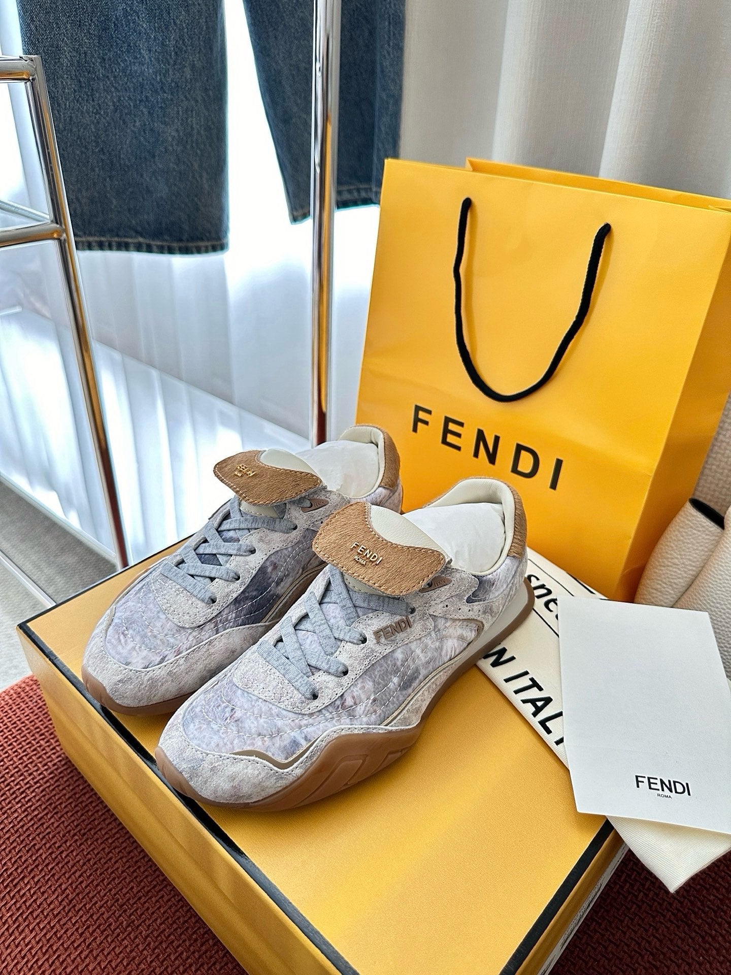 Fendi unisex low-top sneakers, light blue-gray suede panels with tan heel tabs and laces