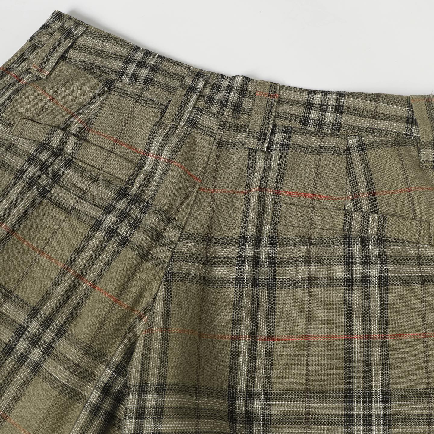 Plaid pants with pleated front, belt loops, and straight hem