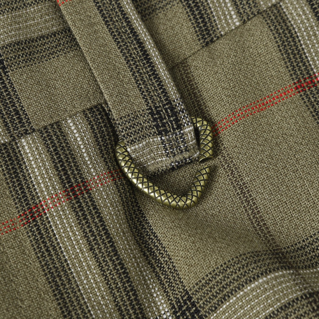 Plaid pants with front pocket seam and small black-trim pull tab