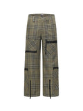 Plaid pants in olive with black contrast panels and utility-style pocket details