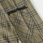 Plaid pants with buttoned waistband and stitched fly