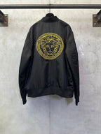 Black Versace bomber jacket with gold Medusa emblem on back
